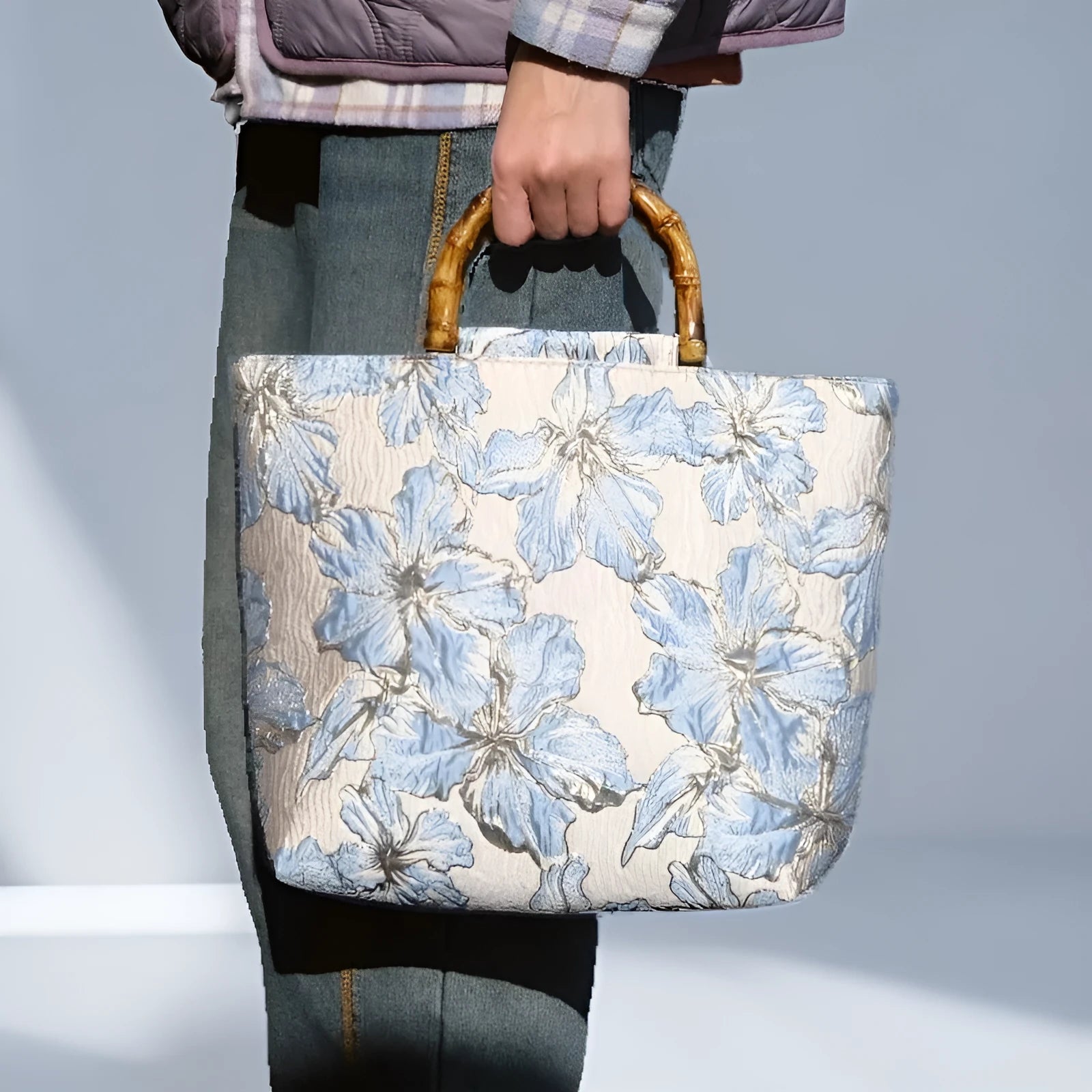 Light blue square canvas shoulder bag with gold bronzing flower pattern and double straps
