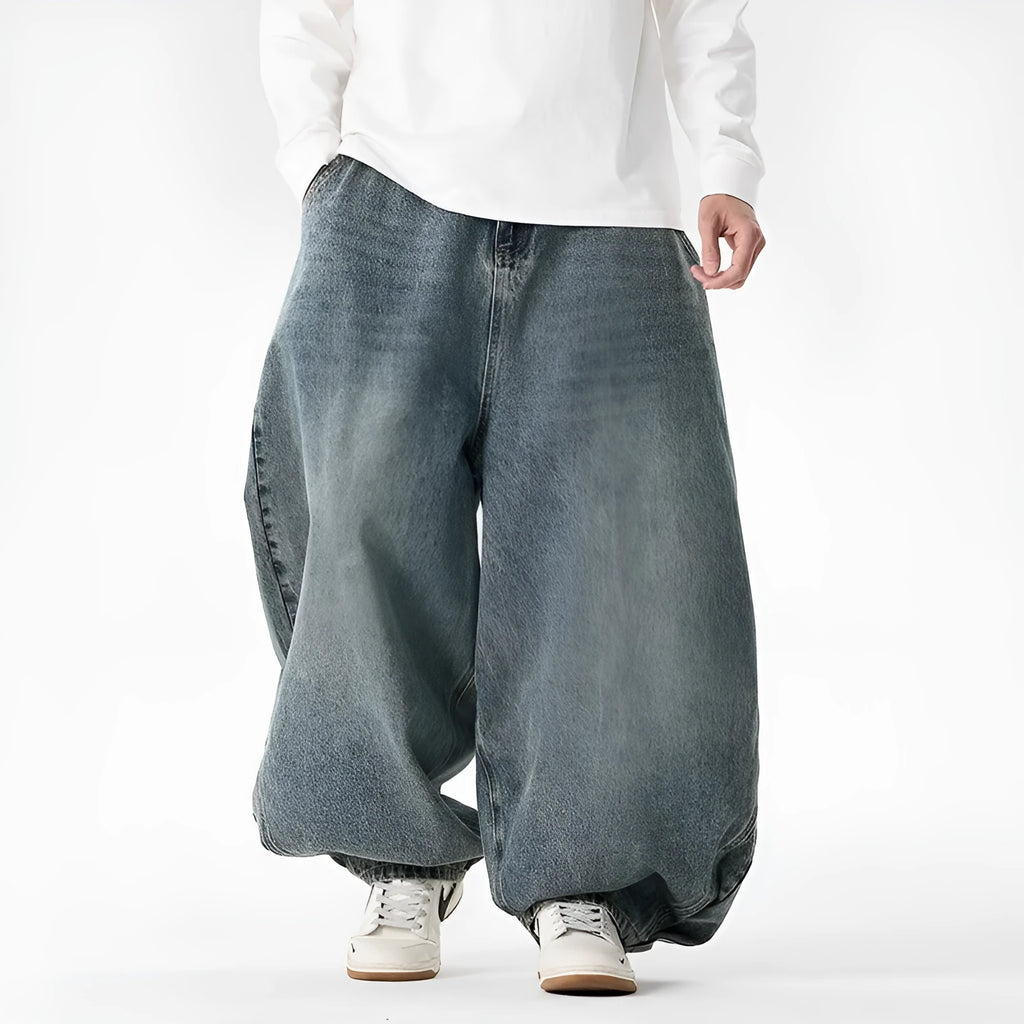 Men's plus size wide leg jeans in denim fabric with straight leg openings and low waist design