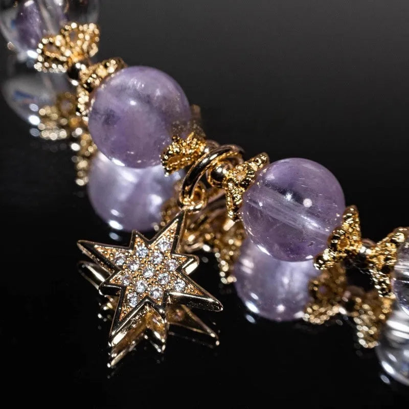 Handmade purple amethyst eight Awn star crystal bracelet for women in a gift box.