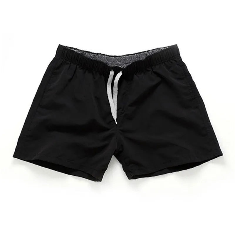 Men's straight leg beach shorts in multiple colours including fluorescent yellow for surfing