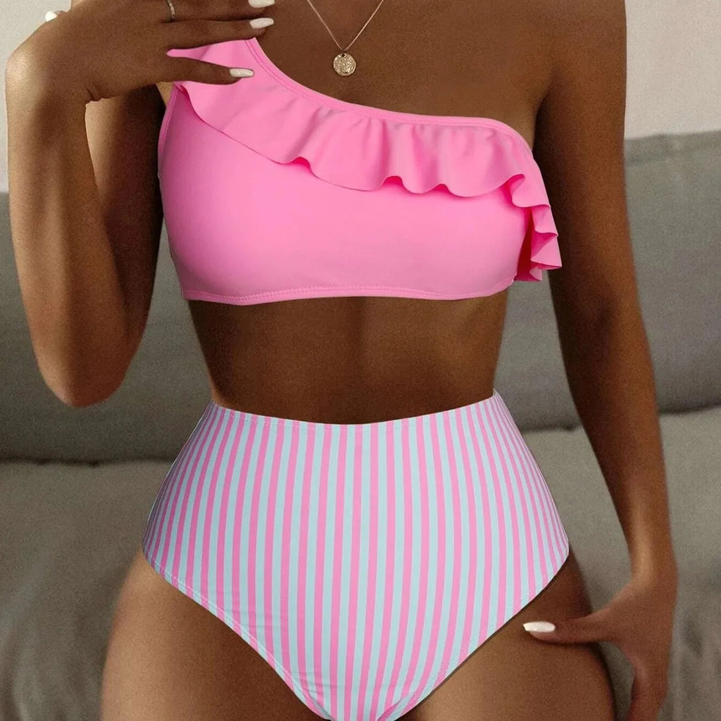 Women's striped and solid colour bikini swimsuit set on a white background.