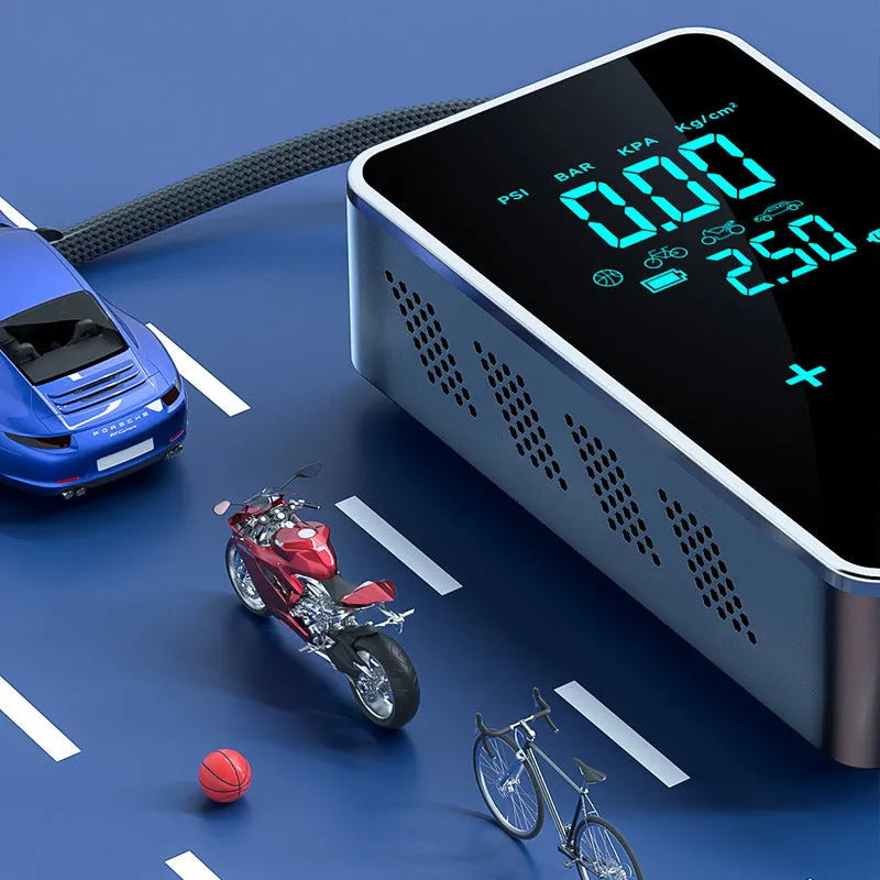 Black wireless car tyre inflator with LCD screen display and attached air hose on a grey background
