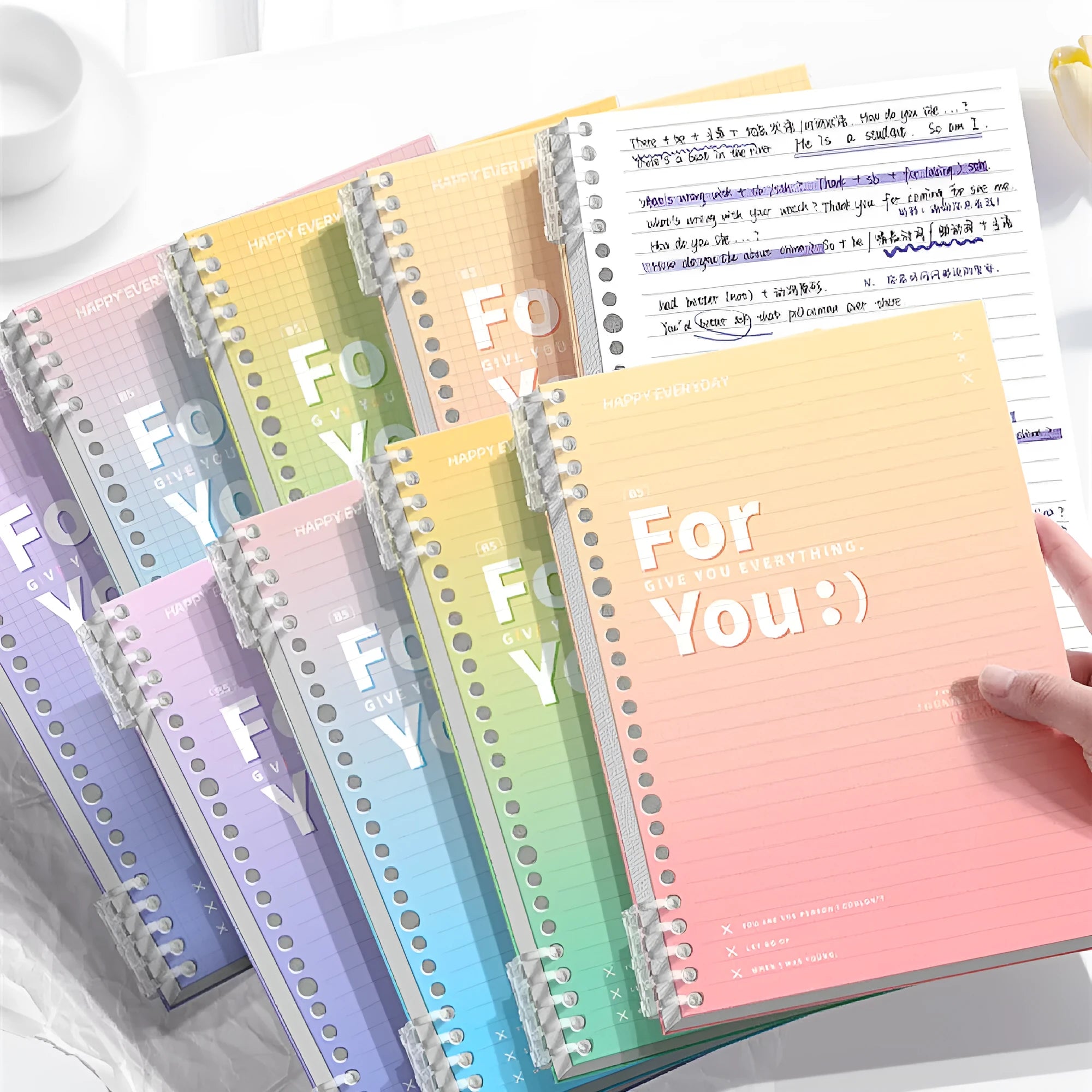 Removable coil gradient notepad with polypropylene cover in blue, green, pink or purple colour options