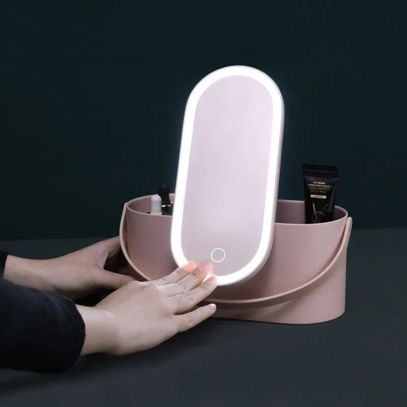 Portable pink makeup mirror storage box with adjustable angle and organiser compartments