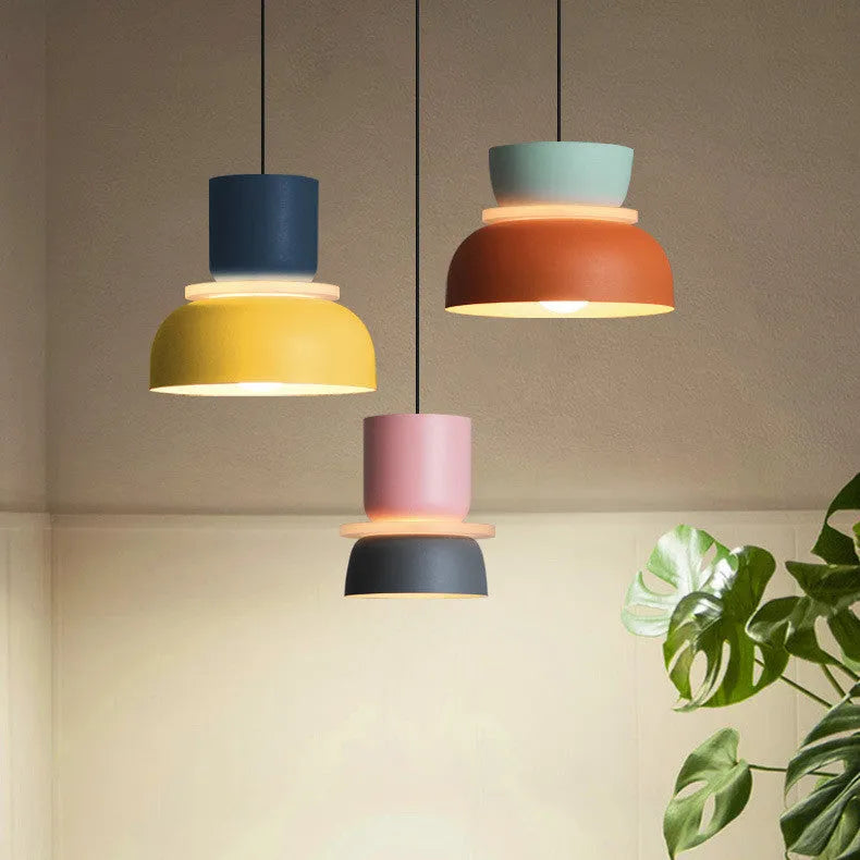 Nordic minimalist iron pendant light with a long fabric cable in a colour-matched finish.