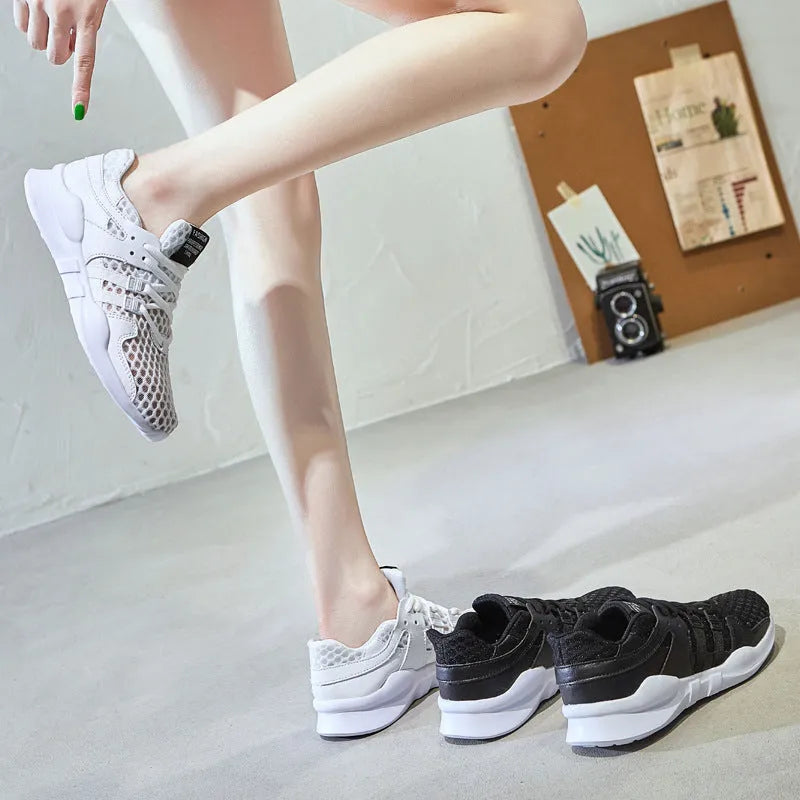 Breathable hollow mesh sneaker in a casual low-top style with round toe and EVA sole.