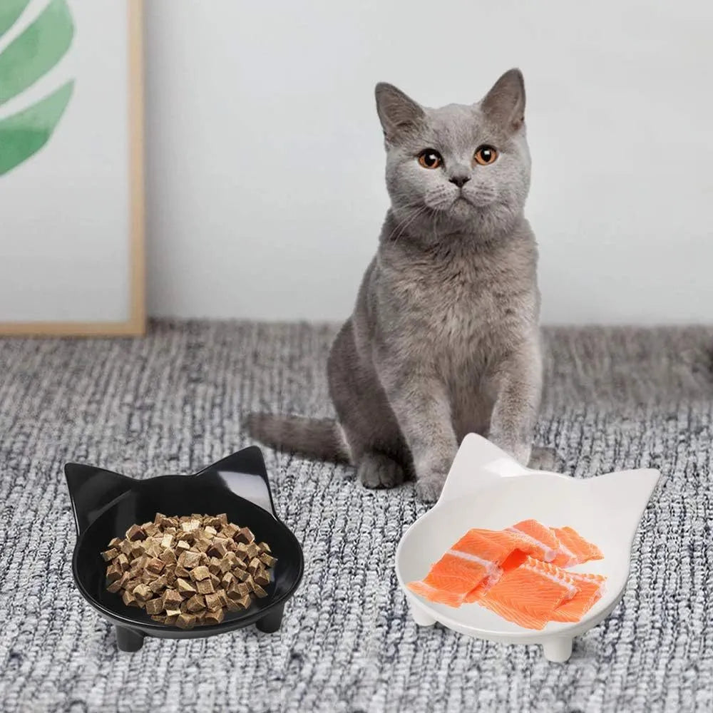 Set of four shallow black melamine pet bowls with non-slip rubber bases