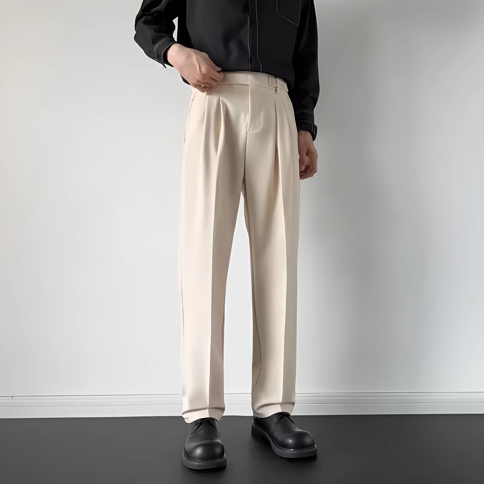 Men's straight loose trousers in apricot colour showing straight leg cut and polyester fabric