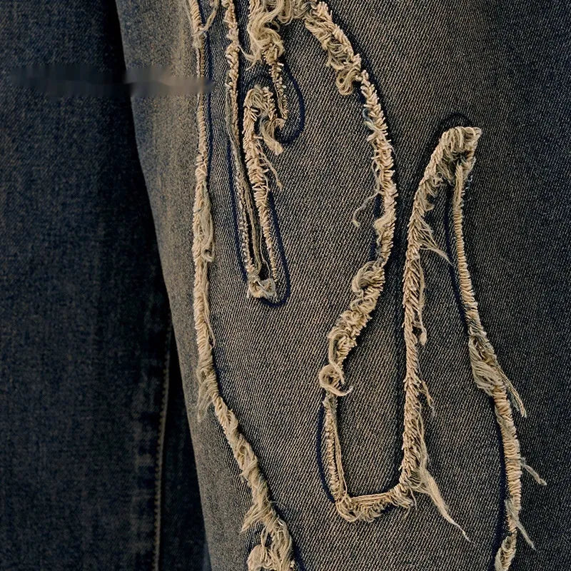Men's cropped denim shorts with flame embroidery patch in black and blue colours, straight cut for summer street style
