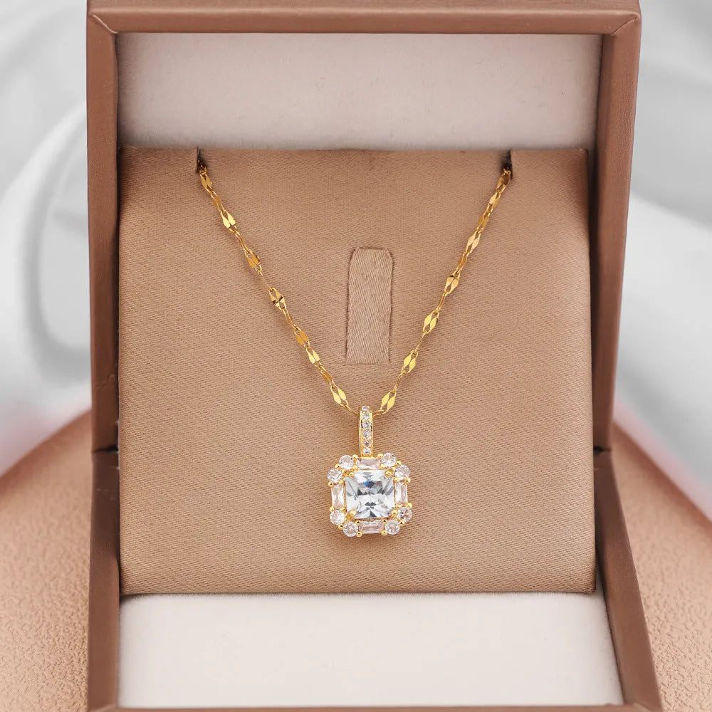 Gold titanium steel clavicle necklace with geometric quadrilateral pendant containing zircon stones