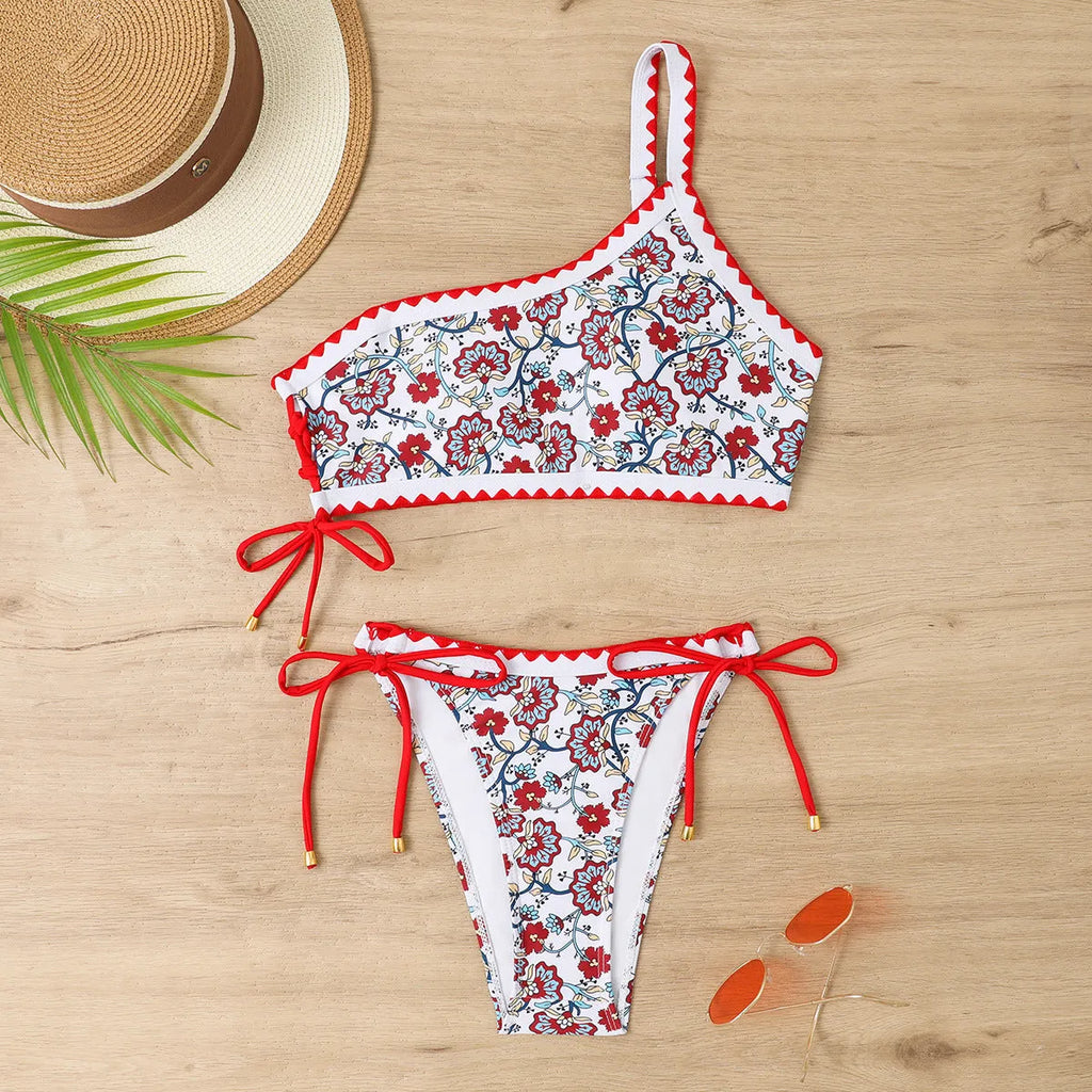 Women's blue and red one-shoulder floral bikini set with briefs-style bottom