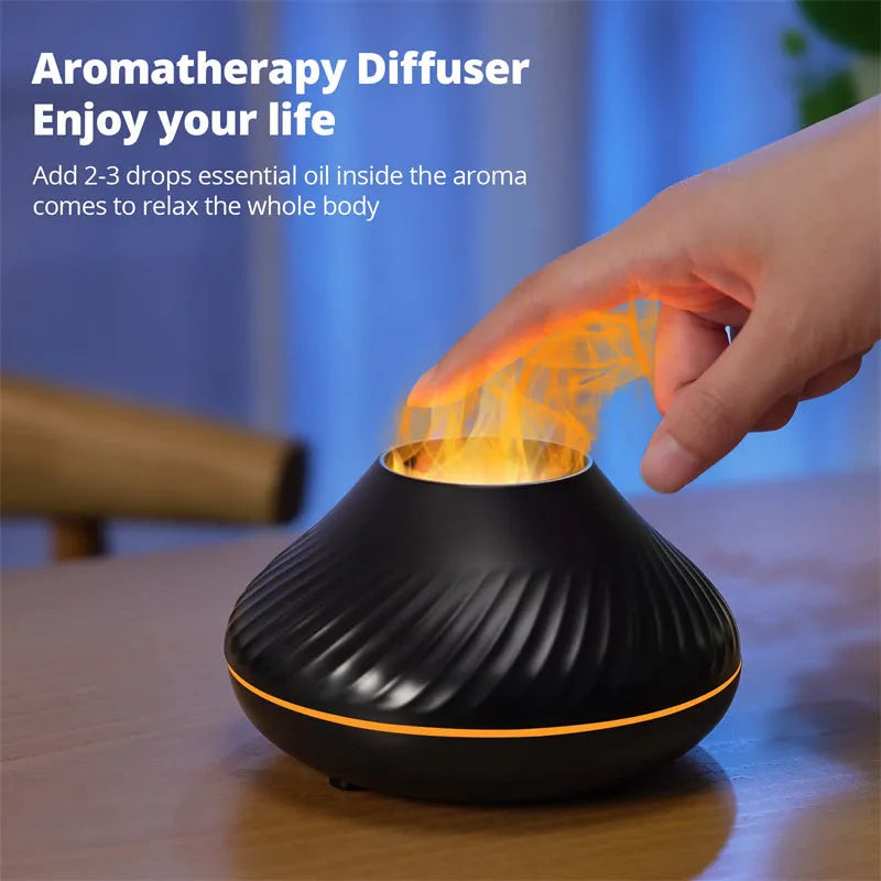Beige USB aroma diffuser with flame-effect mist and colour-changing night light on a wooden table.