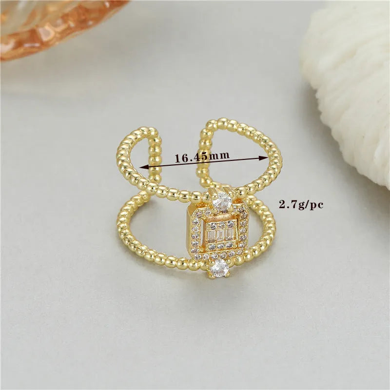 Open ring with adjustable opening in copper gold finish showing U-shaped asymmetrical design