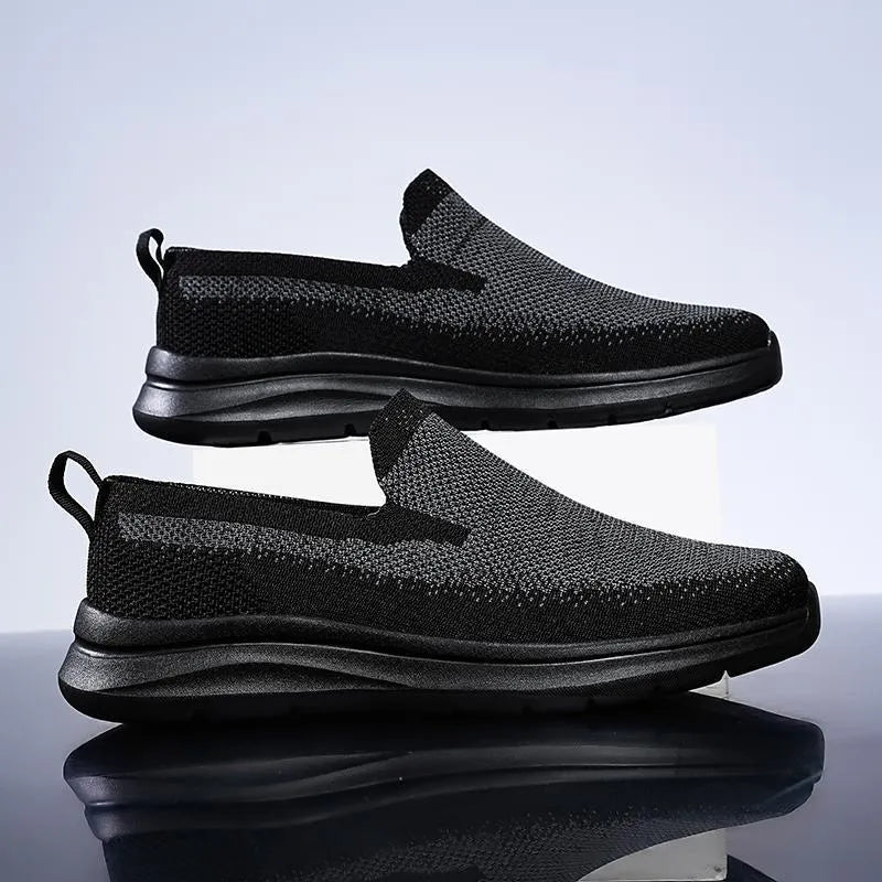 Plus size men's mesh trainers, low top, soft rubber sole, available in black grey, dark blue, sizes 39-48.
