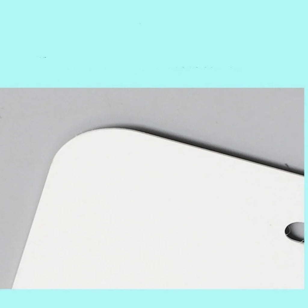 White aluminium licence plate blank sheet measuring 30.3 by 15 centimetres