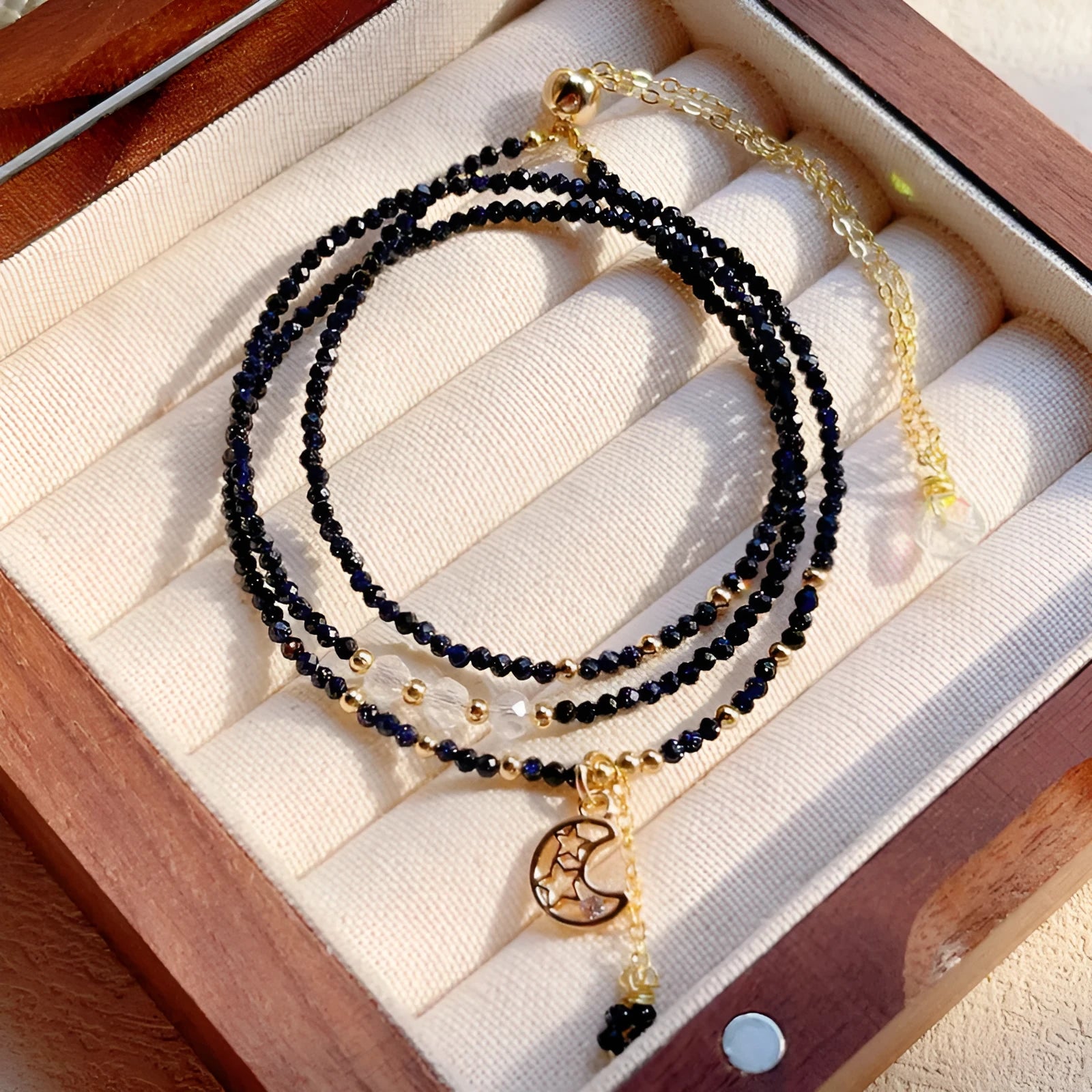 Women's blue San three-ring multi-layer bracelet showing manual craftsmanship details