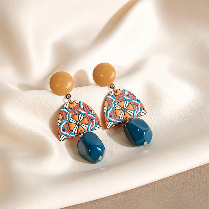 Retro yellow and blue acrylic earrings with irregular geometric shape and electroplated finish, one pair