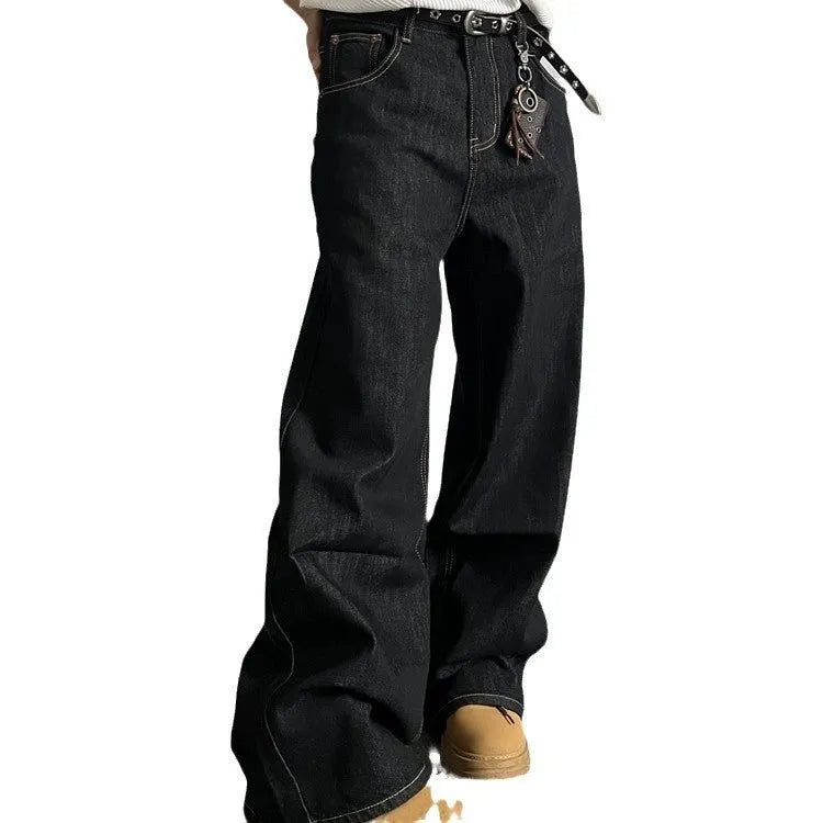 Black retro-style loose-fit straight-leg denim jeans on a hanger.