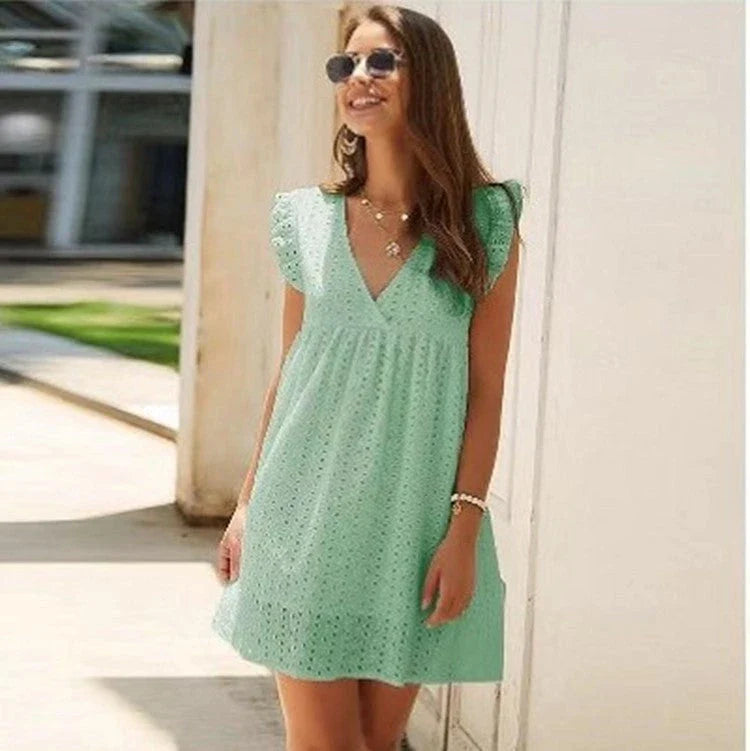 Chic Breezy Cotton Mini Dress with V-Neck, a versatile and comfortable summer fashion item