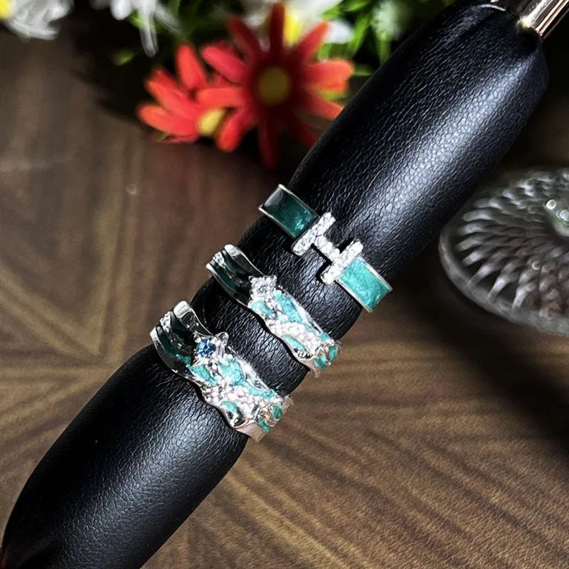 Mint green enamel asterism ring with folded copper construction and dripping oil treatment