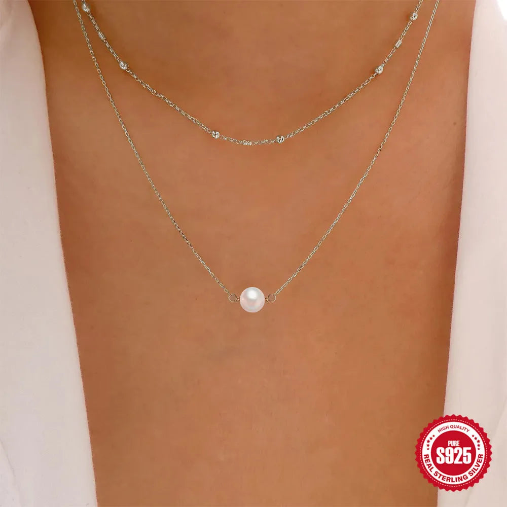S925 sterling silver double layer necklace with twin pearl pendant in geometric design