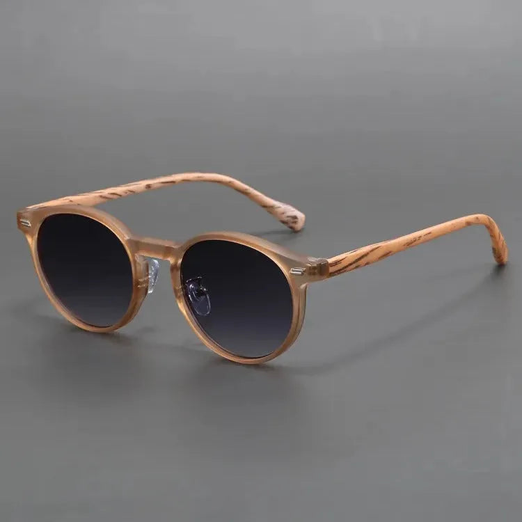 Retro frosted round rim sunglasses in multiple colour options for UV protection.