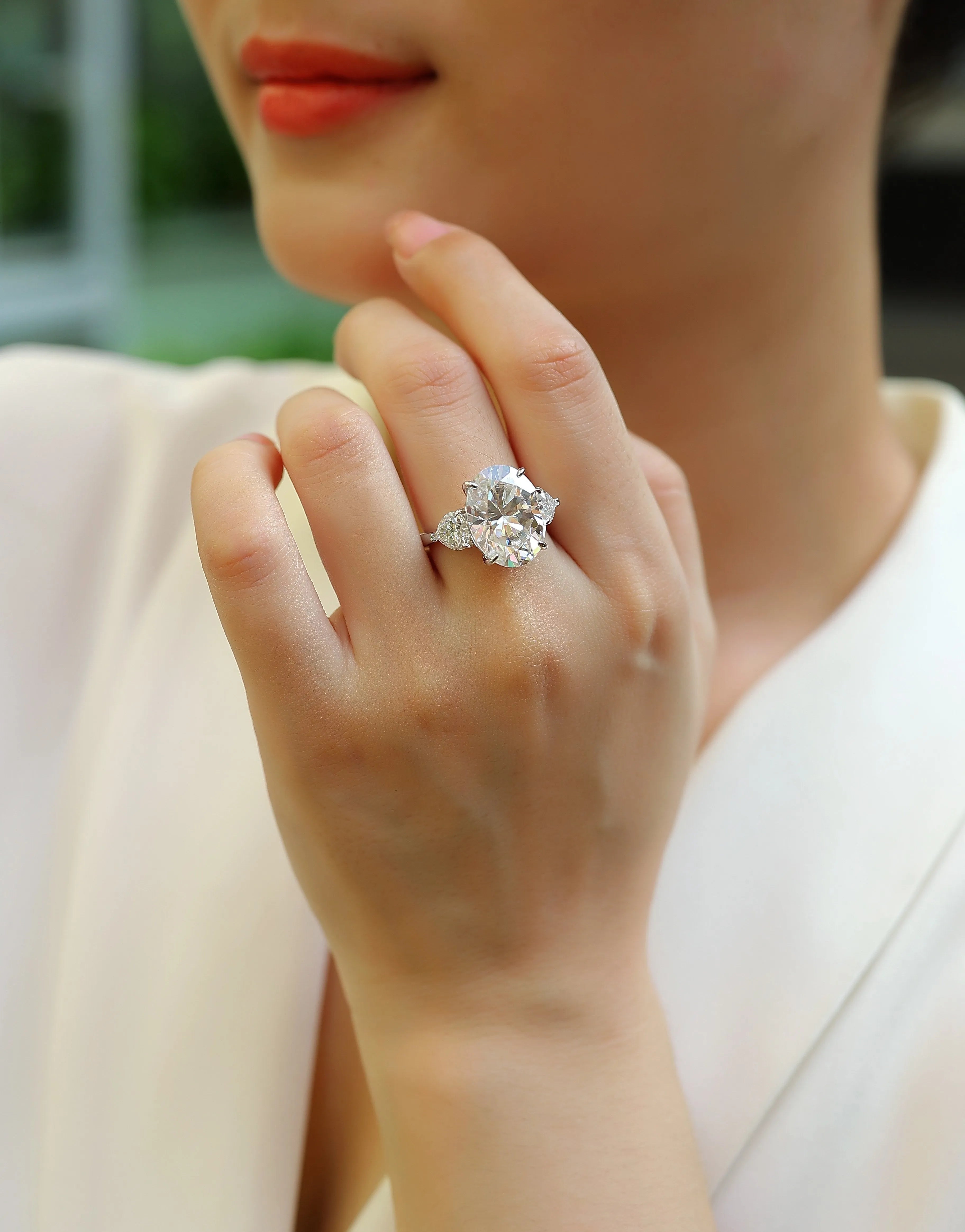 Soul Resonance wedding ring set with egg-shaped moissanite in platinum-plated S925 silver on a white background