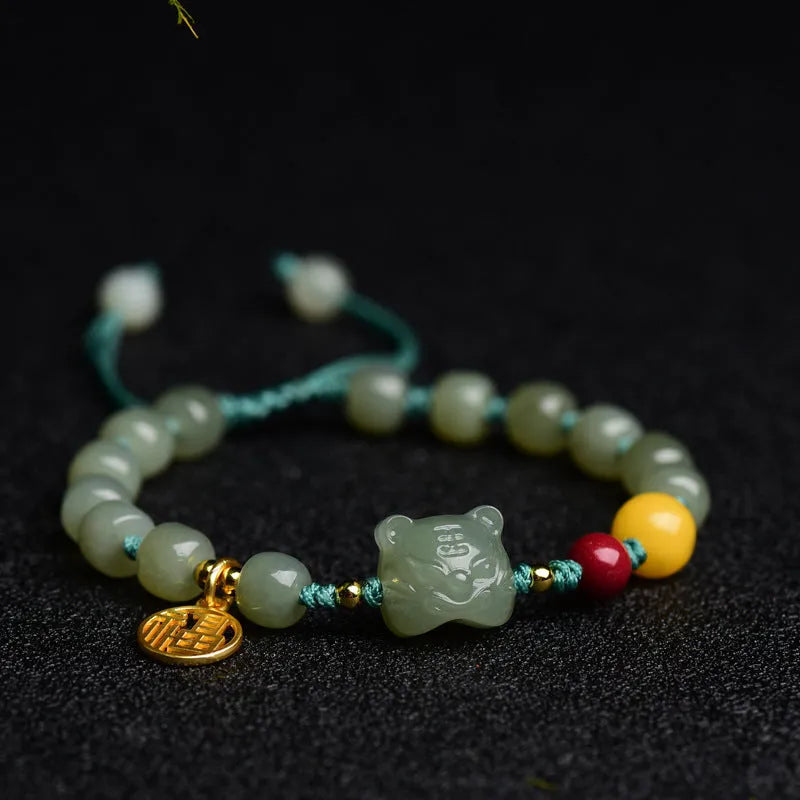 Natural Hetian jade and cinnabar beeswax bead bracelet with 5x7mm beads and Zodiac motifs