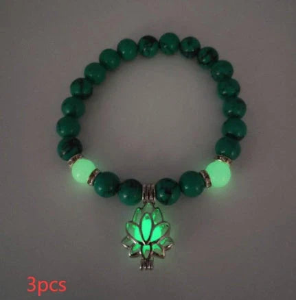 Luminous lotus charm bracelet with mesmerizing glow-in-the-dark beads, made of premium alloy and turquoise fluorescent stone