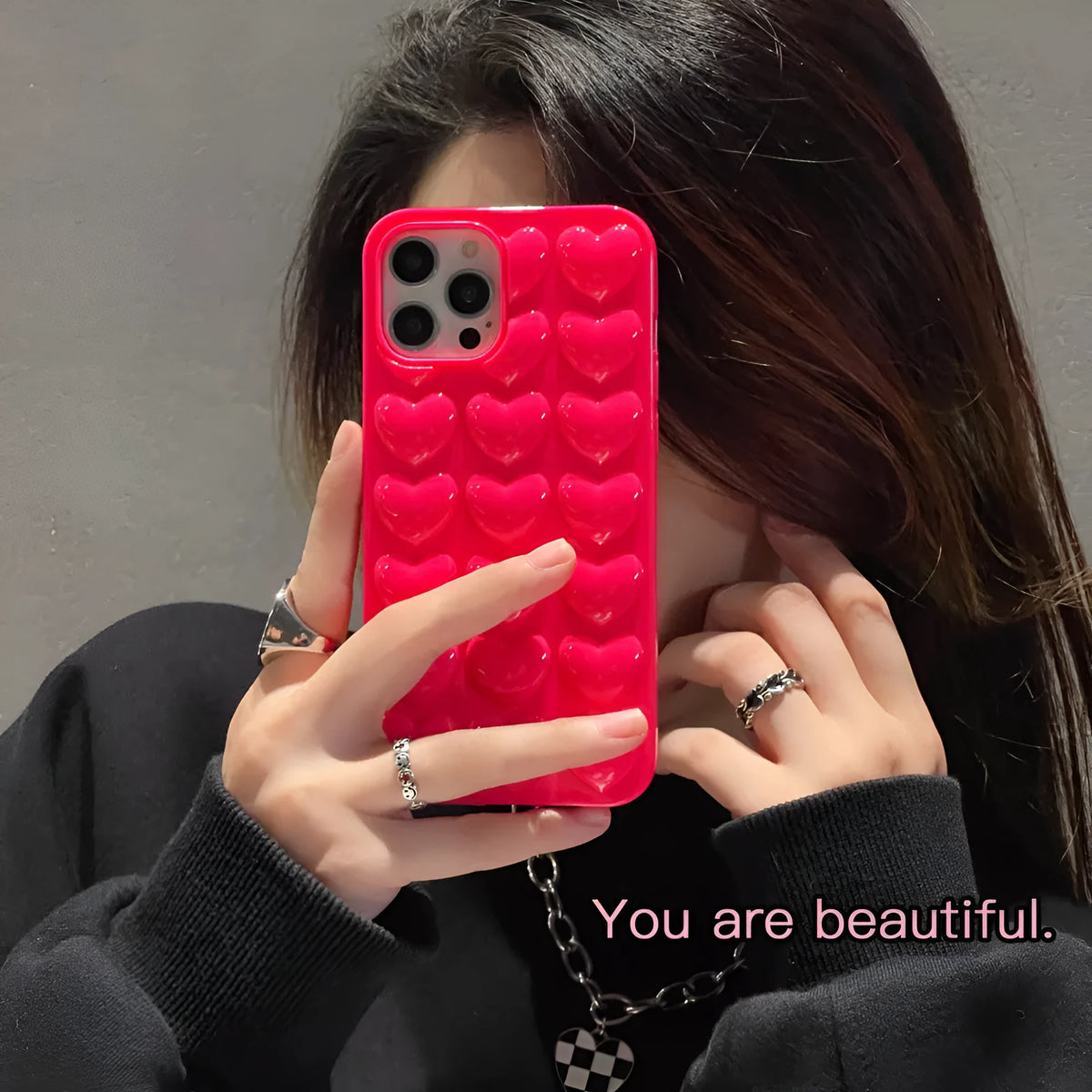 Solid colour 3D heart iPhone case in TPU, back cover style with fall protection, shown for iPhone models