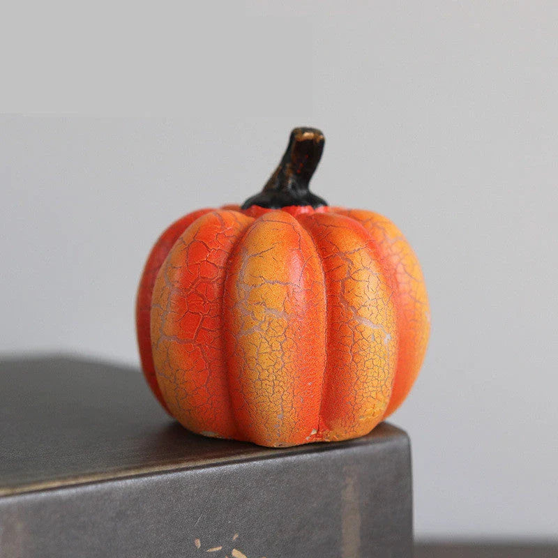 Enchanting resin pumpkin lanterns with realistic textures and LED candle illumination for Halloween decor and celebrations