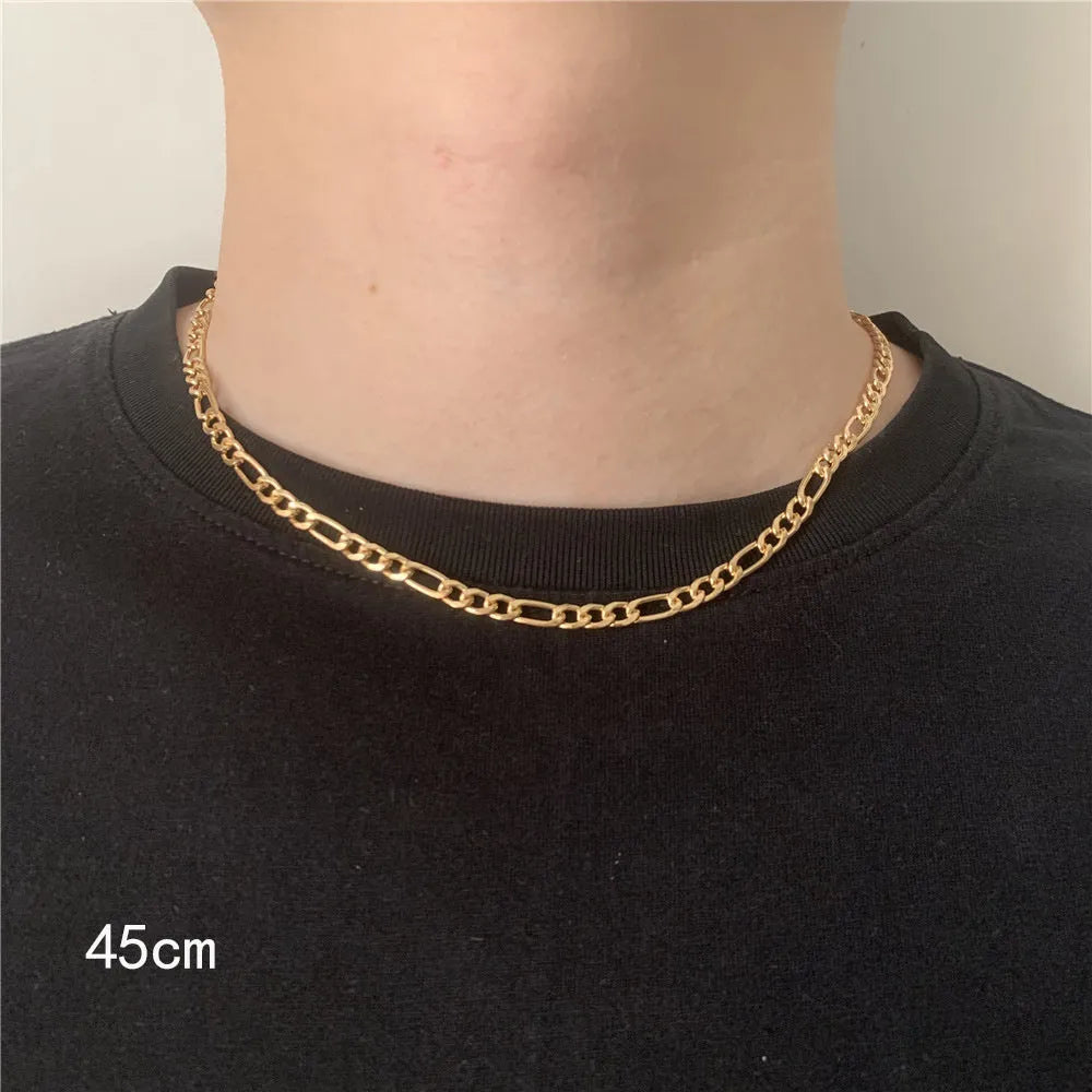 Men's simple electroplated alloy necklace in gold on a grey background