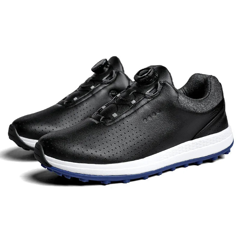Men's white and black casual low-top golf shoes with breathable upper and traction sole.