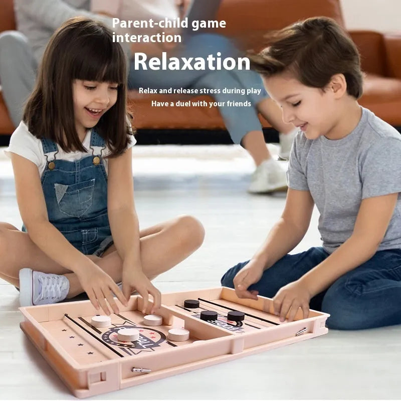 Wooden double battle catapult desktop board game with two-player pieces, shown as a tabletop parent-child puzzle toy.
