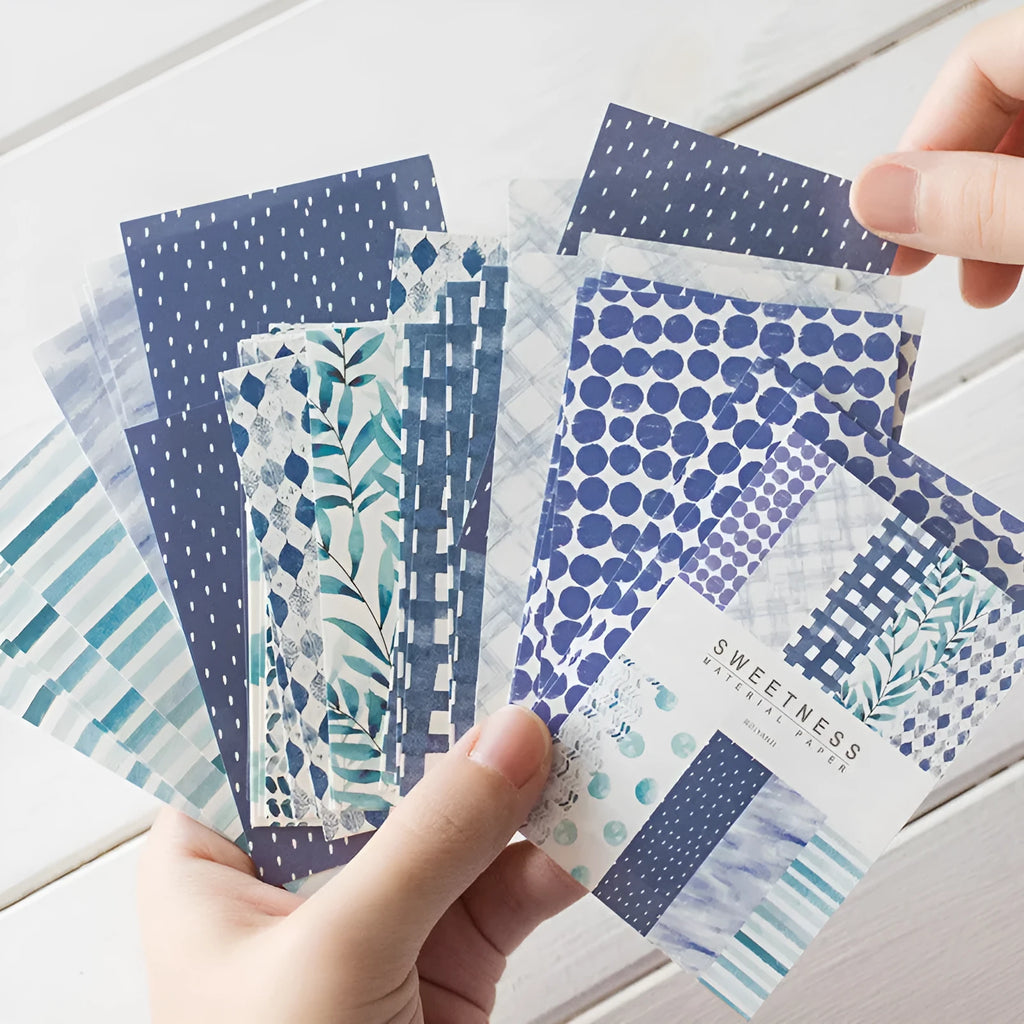 Pack of fifty retro dessert-themed collage note papers in assorted colours, each sheet 56mm by 83mm.
