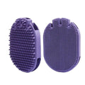 Purple pet shampoo brush with soft bristles and ergonomic handle for dog and cat grooming