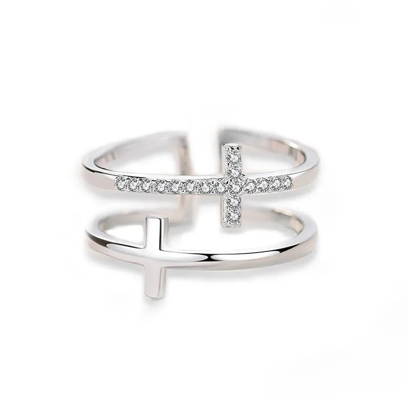 Adjustable double cross geometric copper ring with white gold finish and inlaid zircon gems.