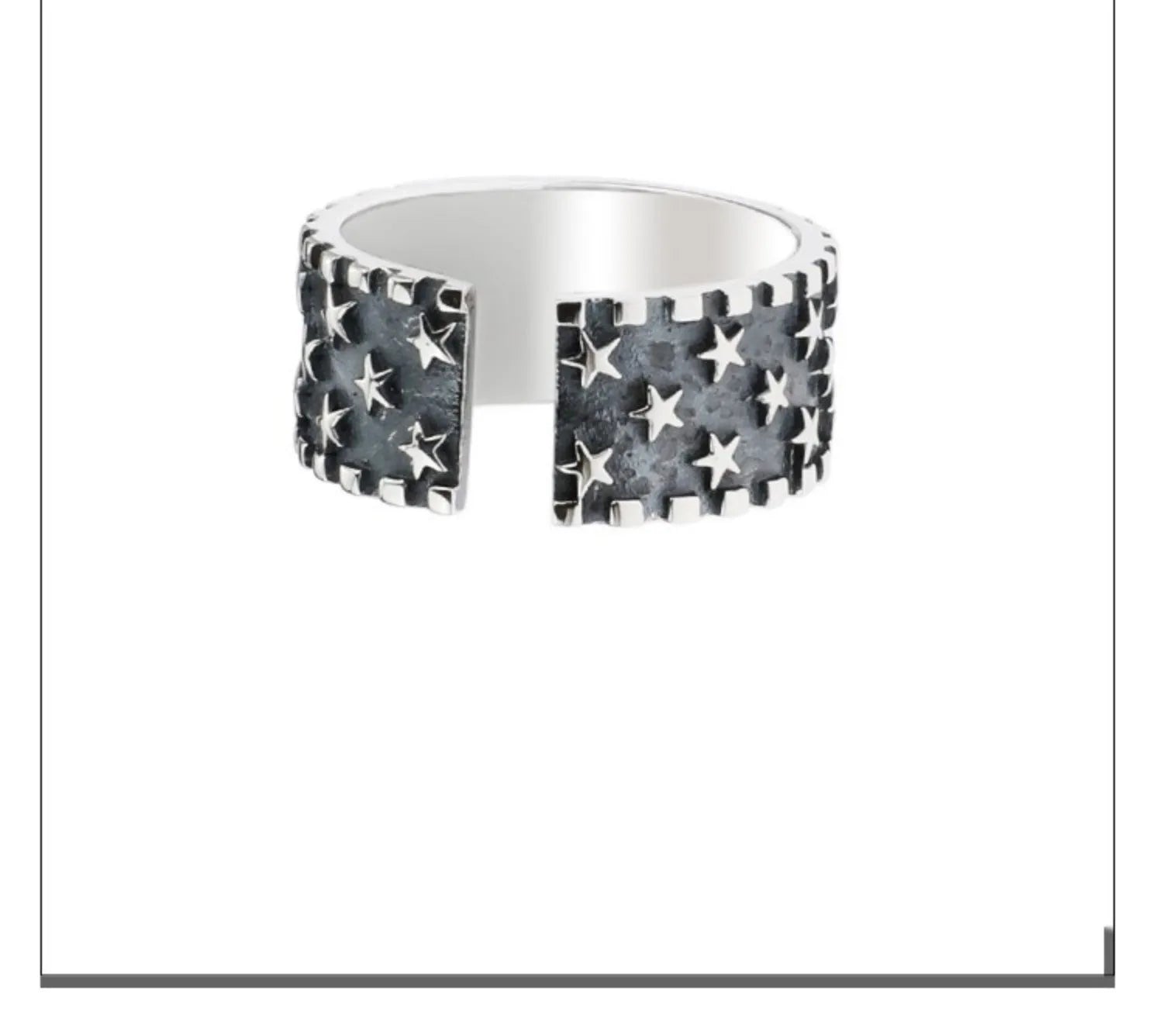 Adjustable sterling silver ring with geometric five-pointed star design on finger