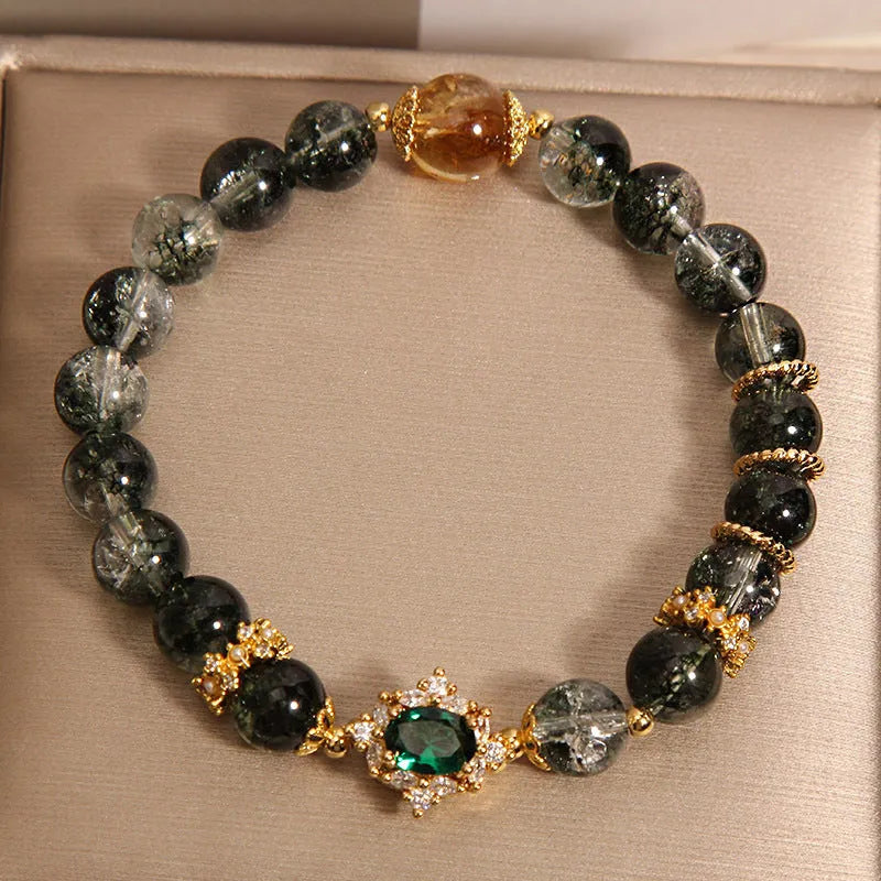 Women's green phantom quartz crystal bracelet with gold rutilated quartz accents and pearl detailing