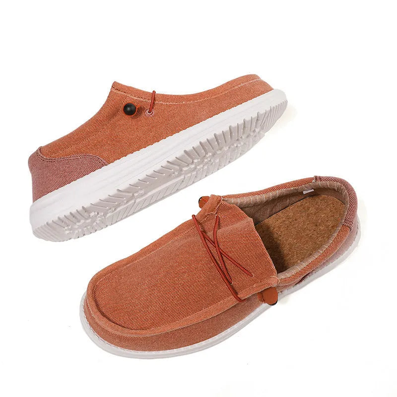 Men's green and orange canvas casual shoes with mosaic pattern detailing and rubber soles