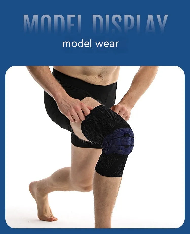Adult sports knee pad in black and blue colour, made from nylon and spandex, shown on a knee.