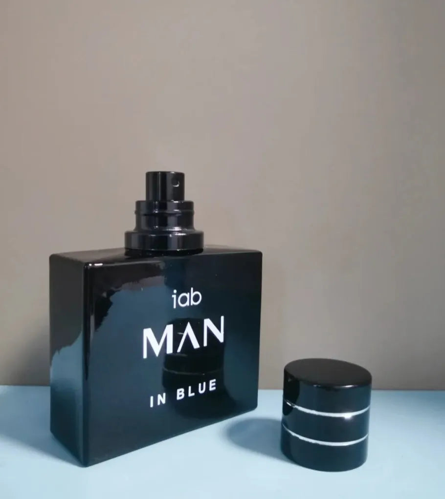 50ml glass bottle of men's citrus perfume with spray top