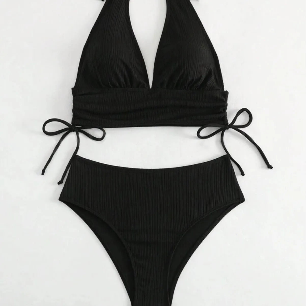 Women's black lace-up halter bikini set with adjustable straps and matching briefs