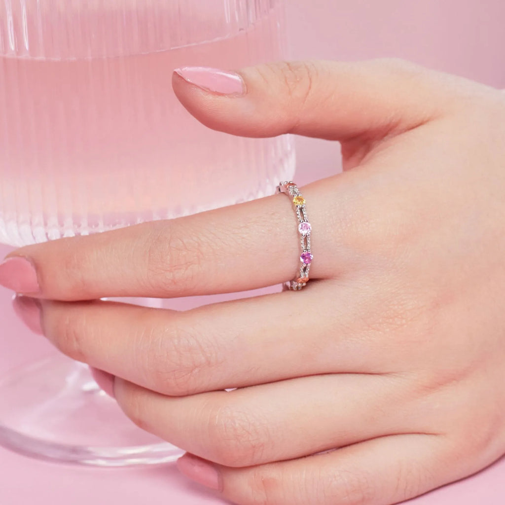 Handmade silver geometric inlaid adjustable ring with electroplated finish on white background
