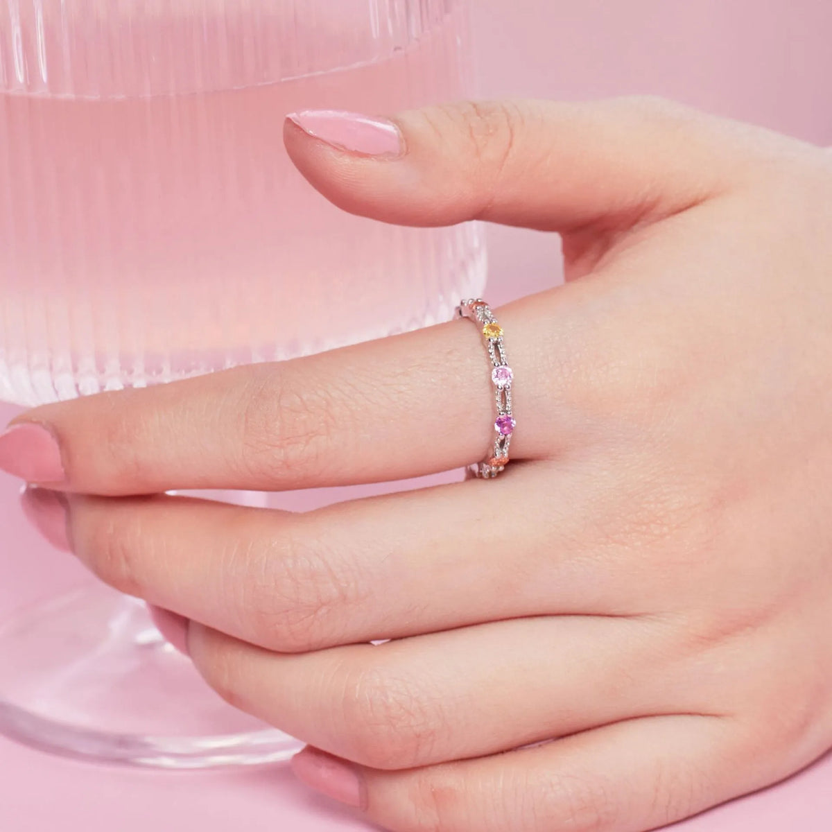 Handmade silver geometric inlaid adjustable ring with electroplated finish on white background