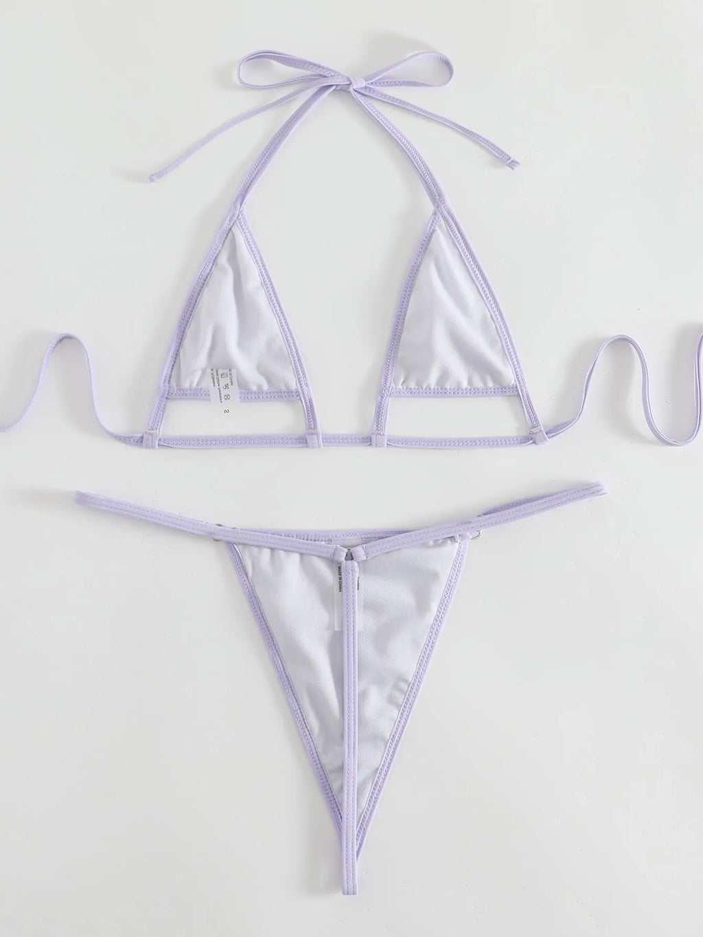 Purple solid colour split swimsuit set with three-dimensional petal accents and lace-up front
