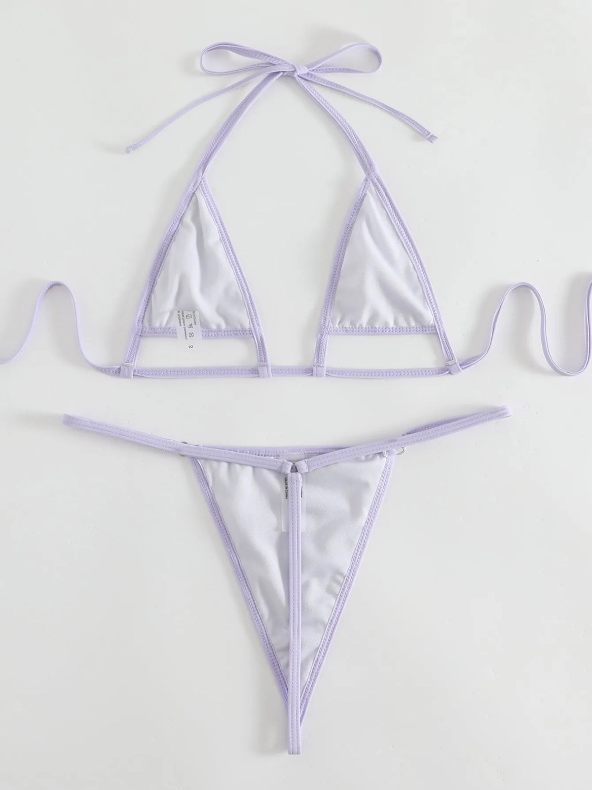 Purple solid colour split swimsuit set with three-dimensional petal accents and lace-up front