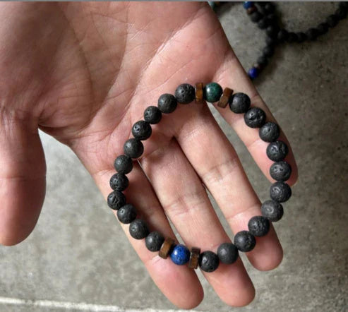 Premium men's black volcanic stone bracelet with unique, durable design and adjustable fit