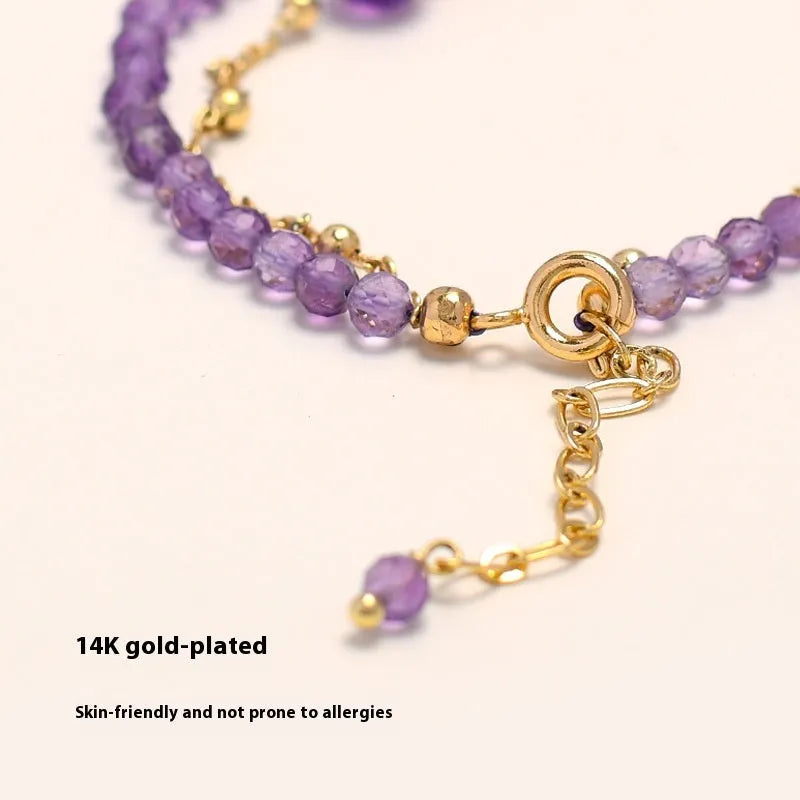 Amethyst-coloured Chinese-style women's crystal bracelet with electroplated finish and diamond shape.