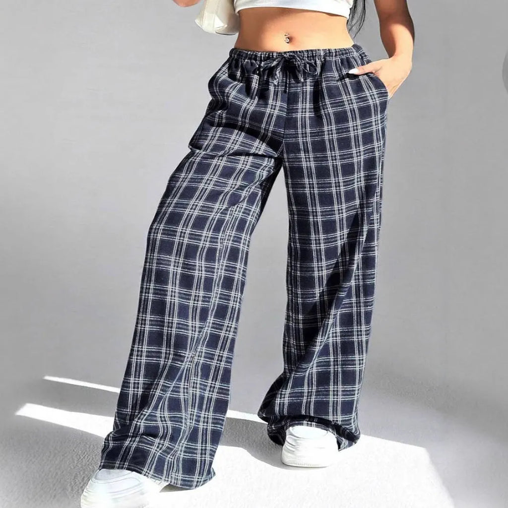 Women's casual trousers with drawstring waist and plaid pockets in blue or red colour options